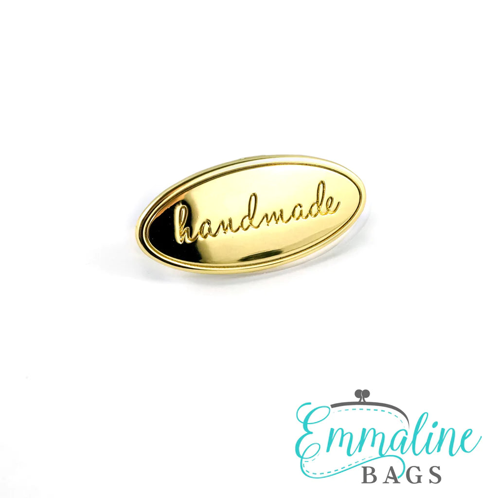 Metal Bag Label: Oval with "handmade" - Black Rabbit Fabric Inc.